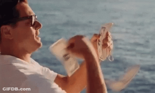 Man Holding Money And Cell Phone GIF