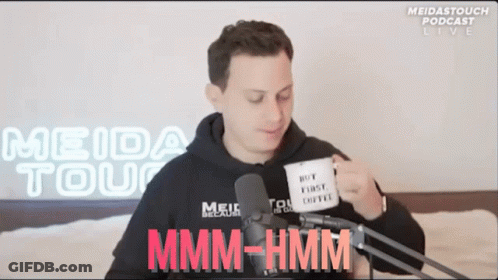 Man Holding Mug Saying Not First Coffee GIF