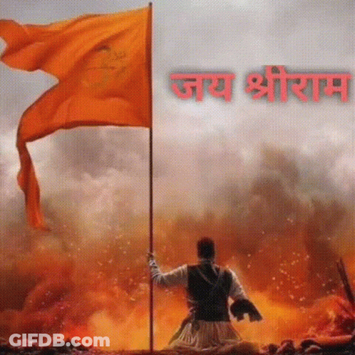 Man Holding Orange Flag In Front Of Flame GIF