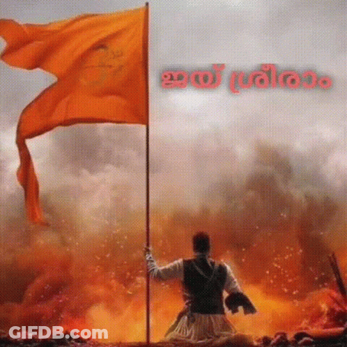 Man Holding Orange Flag Near Flame GIF