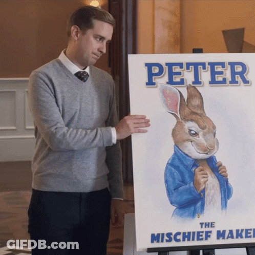 Man Holding Painting Of Peter The Mischief Maker GIF