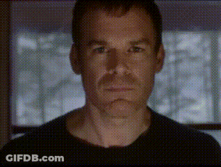Man Holding Paper At Table With Microphone GIF