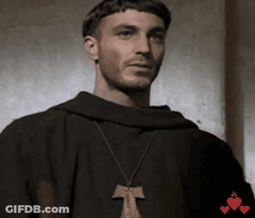 Man Holding Paper In Front Of Blackboard GIF