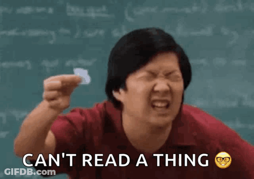 Man Holding Paper In Front Of Blackboard GIF