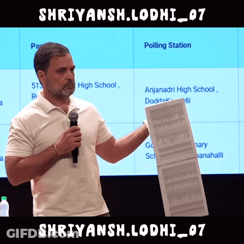 Man Holding Paper In Front Of Polling Station GIF
