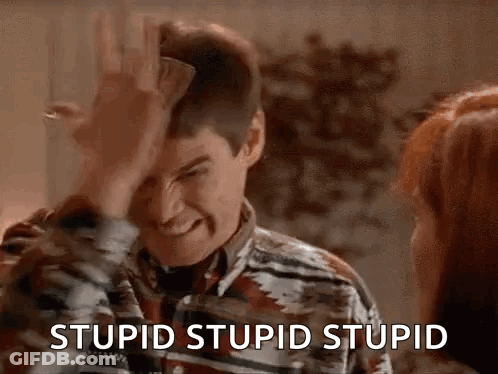 Man Holding Paper Making Funny Face GIF