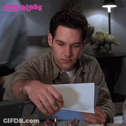 Man Holding Paper Saying Clueless GIF