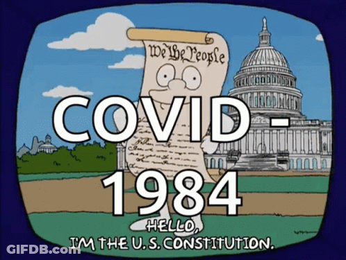 Man Holding Paper Saying Covid 1984 GIF