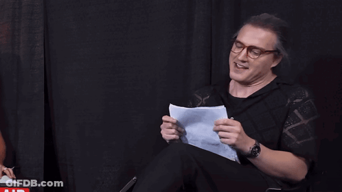 Man Holding Paper Saying I Haven't Thrust In Years GIF