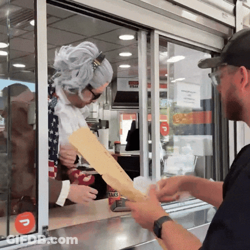 Man Holding Paper Saying Steak GIF