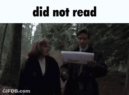 Man Holding Paper Woman Walking In Woods GIF