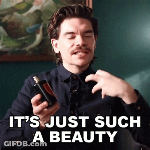 Man Holding Perfume Bottle Beauty GIF