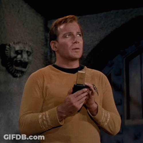 Man Holding Phone Saying Beam Me Up Mr. Spock GIF