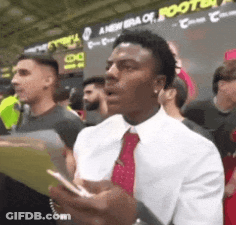 Man Holding Phone Saying New Era Of Roots GIF