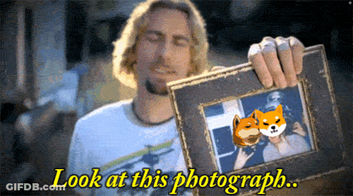 Man Holding Picture Frame Saying Look At This Photograph GIF