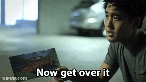 Man Holding Picture Saying Get Over It GIF