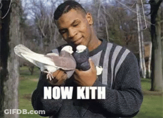 Man Holding Pigeon Saying Now Kith GIF