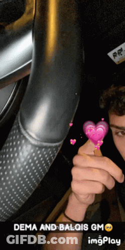 Man Holding Pink Heart Dema And Balqis GM GIF