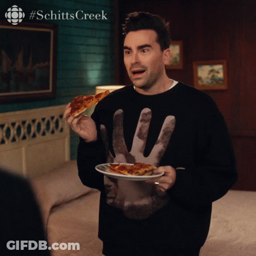 Man Holding Pizza In Schitts Creek Shirt GIF