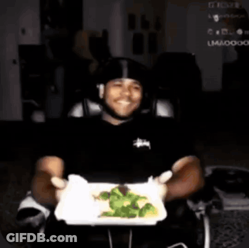 Man Holding Plate Of Broccoli GIF