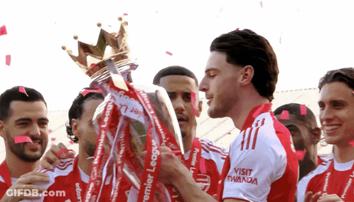 Man Holding Premier League Trophy GIF