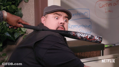 Man Holding Raptor Baseball Bat In Front Of Whiteboard Saying Carries Out GIF