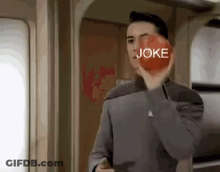 Man Holding Red Apple With Joke GIF