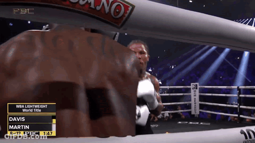 Man Holding Red Boxing Glove On Forehead GIF