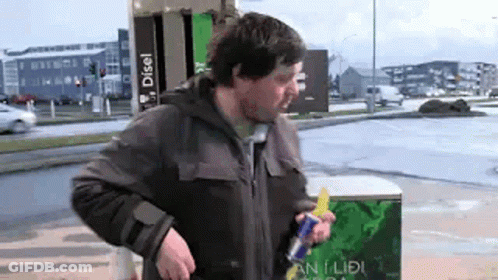 Man Holding Red Bull GIF