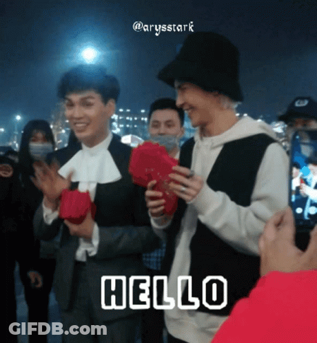 Man Holding Red Fan Saying Hello GIF