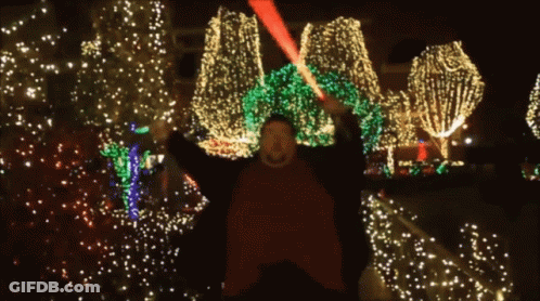 Man Holding Red Lightsaber GIF