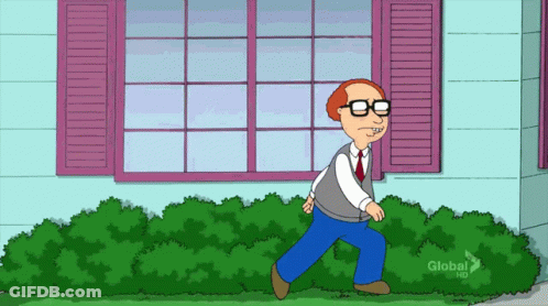 Man Holding Red Rose On Couch GIF