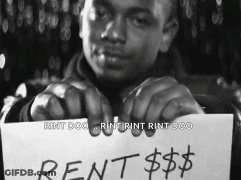 Man Holding Rent Sign GIF