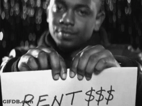 Man Holding Rent Sign GIF