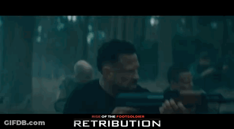 Man Holding Rifle With Retribution GIF