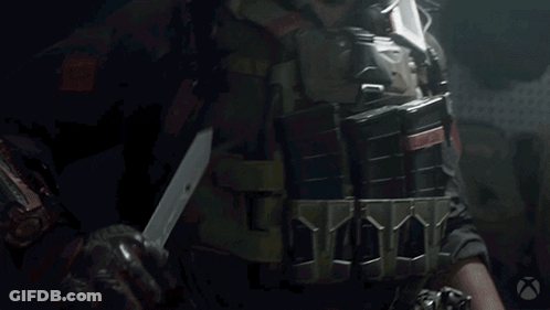 Man Holding Rifle With Silencer GIF
