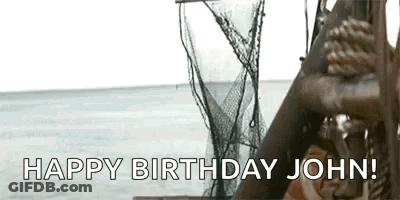 Man Holding Rope In Front Of Boat Says Happy Birthday John GIF