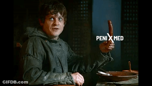 Man Holding Sausage Saying Penis Med GIF