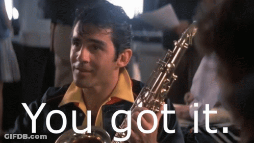 Man Holding Saxophone Saying You Got It GIF