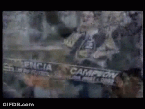 Man Holding Scarf Saying Campeon GIF