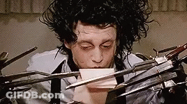 Man Holding Scissors And Paper GIF