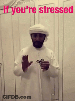 Man Holding Scissors GIF