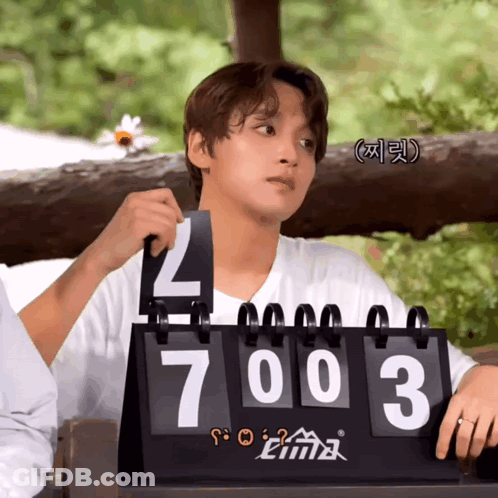 Man Holding Scoreboard 7003 GIF