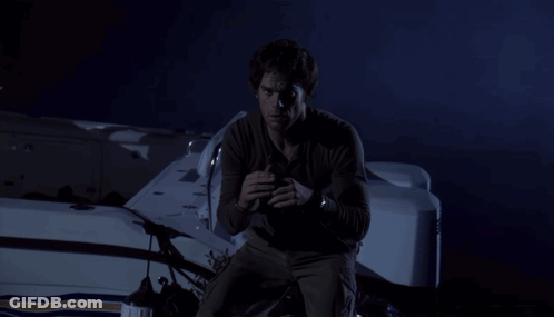 Man Holding Shovel Next To RIP Grave GIF