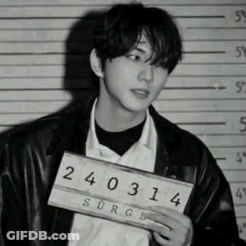 Man Holding Sign 240314 GIF