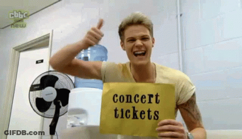 Man Holding Sign Concert Tickets GIF
