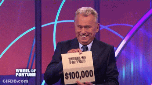 Man Holding Sign Saying $100,000 GIF