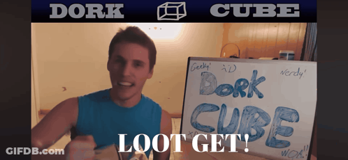 Man Holding Sign Saying Dork Cube GIF