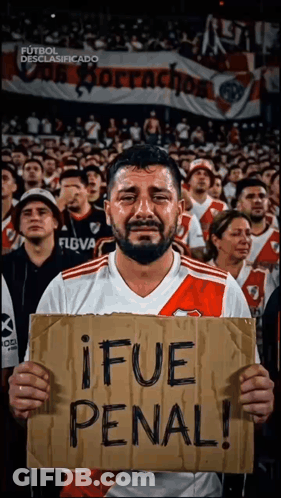 Man Holding Sign Saying Ifue Penal GIF