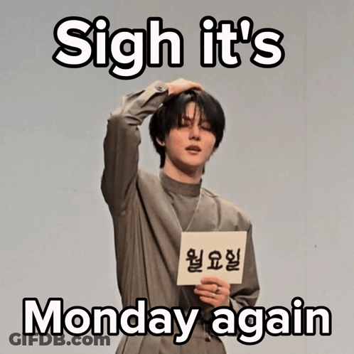 Man Holding Sign Saying Sigh It's Monday Again GIF
